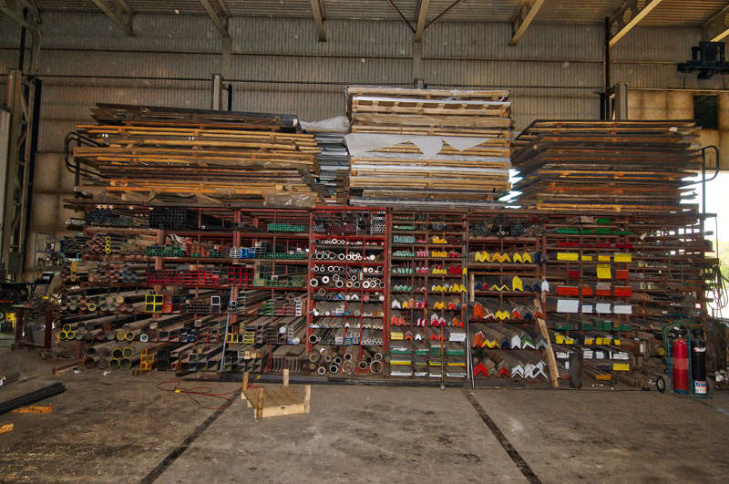 A photo showcasing the inventory and selection of metal located on one side of the warehouse at Hubert Sabourin Inc.